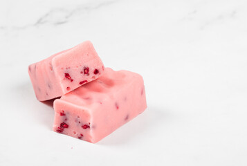 Vegan Raspberry nougat with pieces of freeze-dried raspberries. Close-up	
