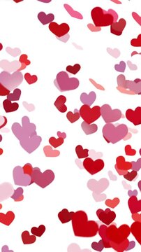 Valentine's vertical animation of romantic red heart-shaped confetti loop