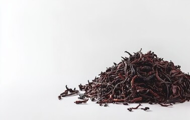 Fototapeta premium Dried Hibiscus Petals Pile on White Background for Herbal Use