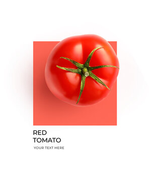 Creative layout made of red tomato on the red and white background. Flat lay. Food concept. Lemon on white background.