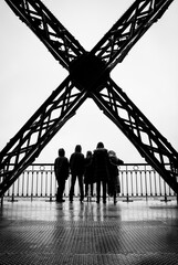 silhouette of people on a structure