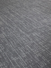 the texture of the gray office carpet with a pattern