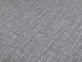 the texture of the gray office carpet with a pattern