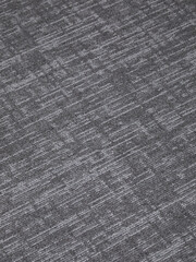 the texture of the gray office carpet with a pattern
