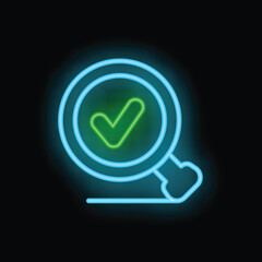 Neon magnifying glass showing green check mark symbol on black background representing concept of search engine optimization