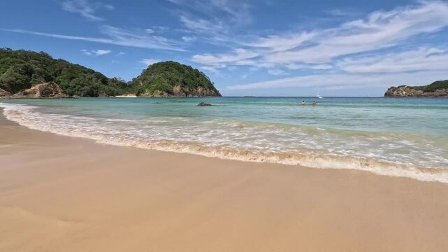 Matapouri Bay Beach New Zealand Pan Right To Waves