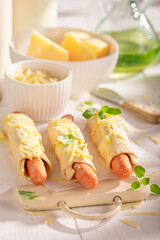 Tasty hot dogs served on a light table.