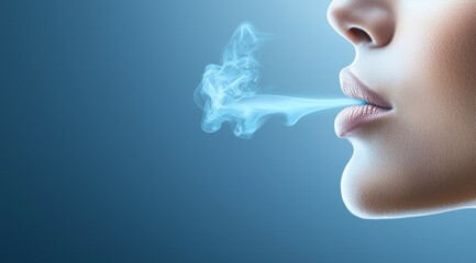 Close-up of woman blowing smoke against blue background
