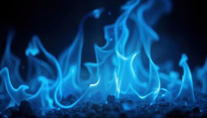 Mystical blue flames dance in the dark. Ethereal beauty. Intense energy source. Dynamic movement. Glowing fire. Supernatural magic element. Enchanting visuals.