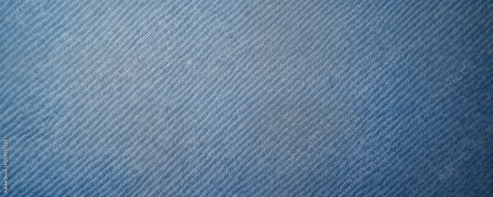 Poster Closeup view of denim texture. Fabric shows weave pattern. Blue tone is a muted shade. Perfect for background design or fashion illustration. Suitable for apparel or decor projects.