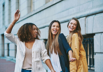 Dancing, laughing or women in city for holiday travel and bonding together for friendship. Happy, diversity and silly people with smile on street of urban town for adventure, funny joke and reunion