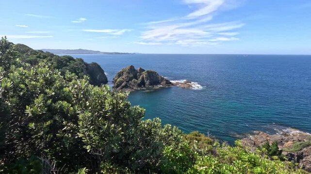 Matapouri Bay New Zealand Pan Right To View Of Open Ocean