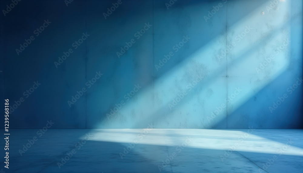 Poster Empty room with blue walls, floor. Sunlight casts shadows. Ideal for product presentation design projects. Stylish background design. Modern, minimalist aesthetic. Empty space for creative purposes.