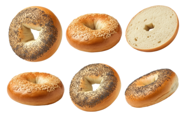 Assorted bagels with sesame and poppy seeds, one sliced in half