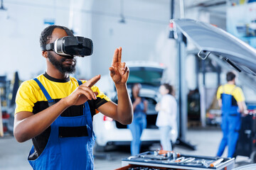 Professional in auto repair shop using virtual reality technology to visualize car compressor belt in order to fix it. Garage employee wearing futuristic vr headset while mending out of order vehicle