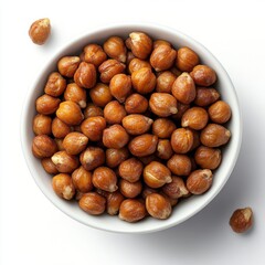 Obraz premium Bowl of Roasted Hazelnuts on White Surface with Few Nuts Scattered Around for Healthy Snack Concept