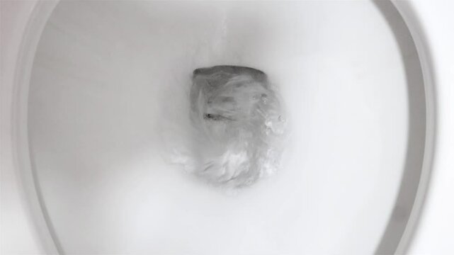 The flushing process in the toilet bowl, top view
