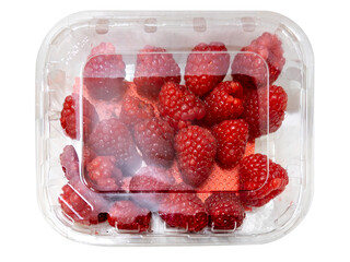 Raspberries in clear plastic box for sale, isolated © framarzo