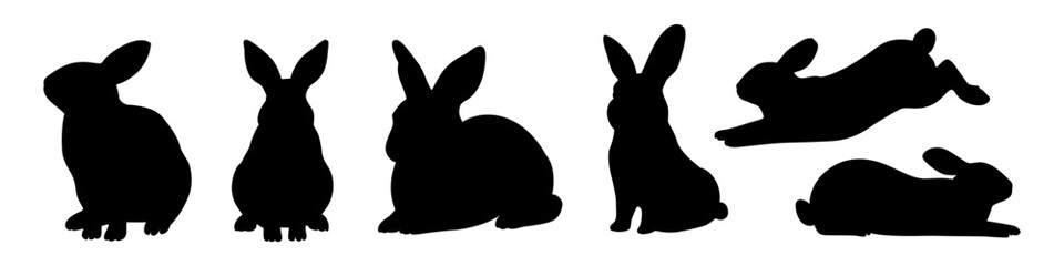 A set of black rabbit silhouettes in different positions, including sitting, jumping, and lying down. Perfect for design and decoration