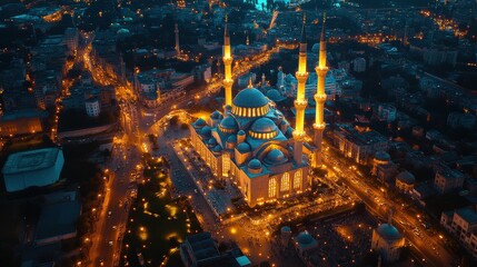 Fototapeta premium Stunning Aerial View of a Cityscape with Illuminated Mosques and Streets for Eid Festivities