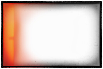 Vintage noir style photo film frame of an old camera with vignetting, dusts and scratches and red flare on transparent background (png image).