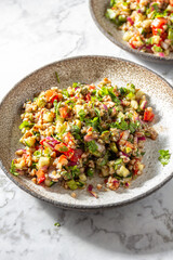 Buckwheat tabbouleh salad. Traditional middle eastern or arab dish. Levantine vegetarian salad.