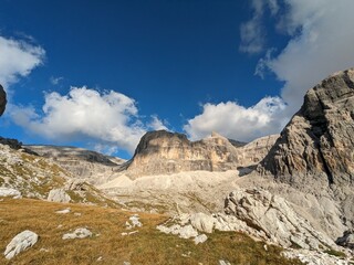 Fototapeta premium Dolomites mountains panorama landscape view Italy-with mountain meadows,lakes and rocky and sharp mountain tops,Dolomite Alps mountains, Trentino Alto Adige region, Sudtirol 