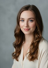 Fototapeta premium Professional portrait of a smiling woman with long hair and blue eyes