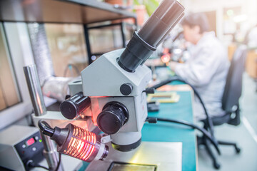 Microscope and Electronic Equipment in Lab Setting