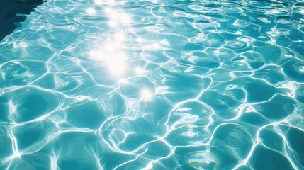 Obraz premium A high-angle view of shimmering pool water on a sunny summer day, with the ripples and reflections blending into a calming and mesmerizing mosaic of light.