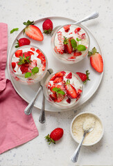 Coconut dessert with fresh strawberries in a glass .top veiw