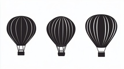 Obraz premium Three Silhouettes of Hot Air Balloons