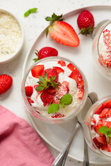 Coconut dessert with fresh strawberries in a glass .top veiw