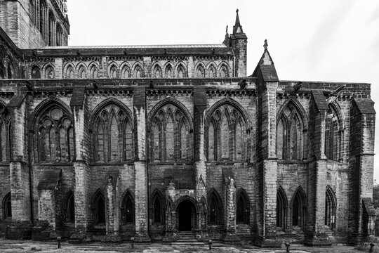 The majestic Dunfermline Abbey in Scotland stands as a testament to history, showcasing intricate stonework and architectural details.