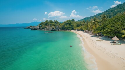 Fototapeta premium Aerial View Of Tropical Beach With Turquoise Water And Lush Greenery