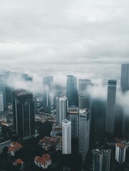 Aerial view panorama of Singapore skyscrapers with city skyline during cloudy summer day. - ai