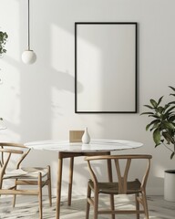Minimalist dining room with a round marble table and two chairs A black framed poster hangs above the table A potted plant sits in the corner