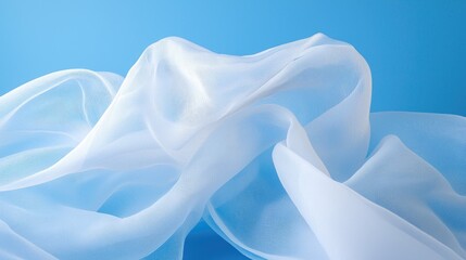 Blue silk fabric waves, light blue background, studio shot, website banners