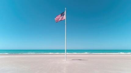 Fototapeta premium US flag waves on beach, clear sky; patriotic backdrop