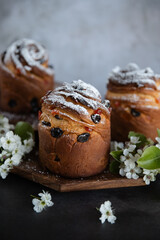 Easter cake cruffin on a wooden tray. Easter Holiday.