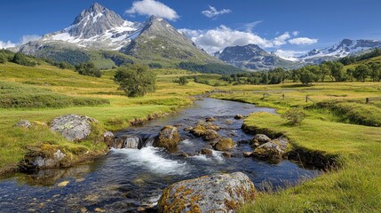 Alpine stream flows through meadow, majestic mountains backdrop, sunny day, nature scene