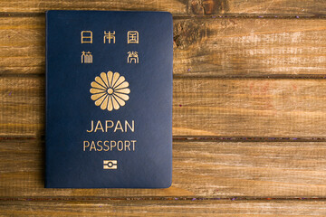 japanese passport on wooden background