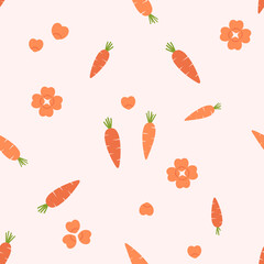 Seamless pattern with carrots cut into heart shapes on pink background vector.