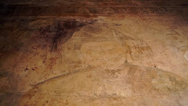 Intricate ancient wall art at Ananda Temple in Bagan, Myanmar, depicting one of the many Yidams or Buddha figures. A breathtaking glimpse into Buddhist tradition and artistry.