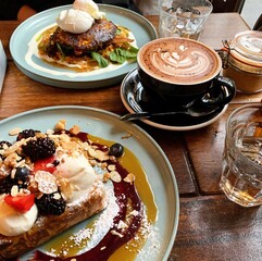 A beautifully presented meal and a refreshing beverage served at a modern restaurant, showcasing the rich flavors and vibrant dining culture