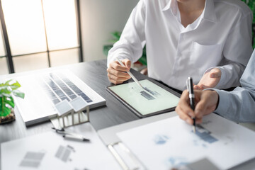 Solar panels green energy Business man working green eco friendly office business creative idea Planing Bio economy for business eco friendly professional Engineer sustainable electricity.