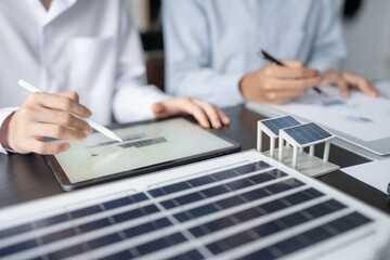 Solar panels green energy Business man working green eco friendly office business creative idea Planing Bio economy for business eco friendly professional Engineer sustainable electricity.