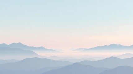 Obraz premium Serene Panorama of Misty Mountains at Dawn, a Pastel-Colored Landscape Depicting Tranquil Beauty