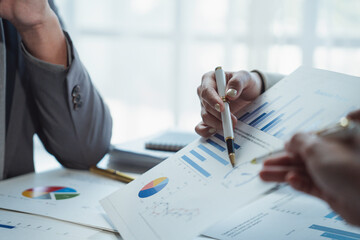 Business Professionals Analyzing Financial Reports Together