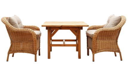 Two rattan armchairs with cushions and wooden table on transparent background